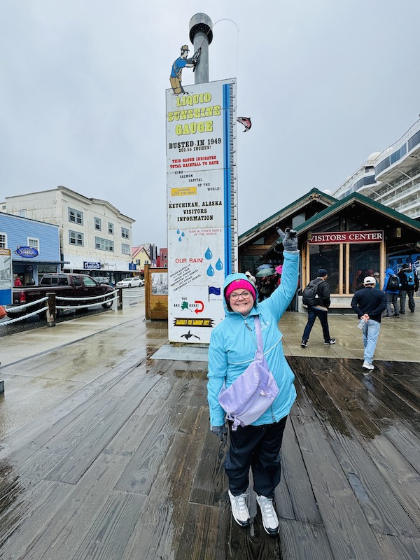 Ann in Ketchikan, Alaska with her Calpak crossbody bag